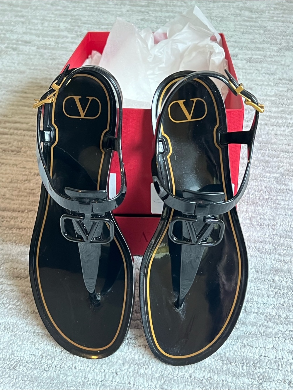 AUTHENTIC 
Valentino Black Jelly VLogo T-Strap Sandals with Gold Trim